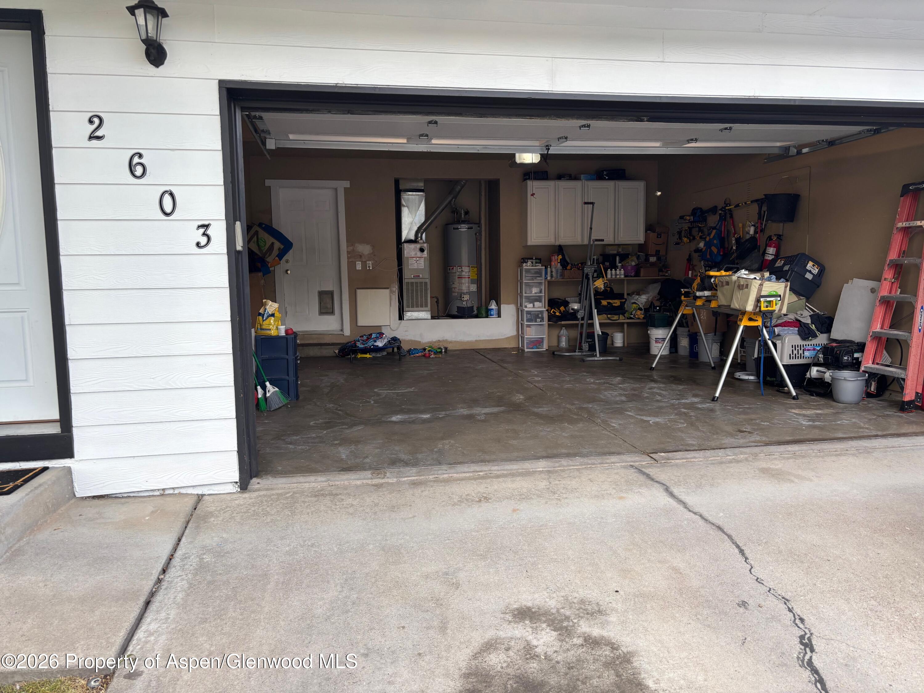 2603 Acacia Avenue Rifle, CO 81650 - Photo 24 of 29 a view of a garage with a table and chairs