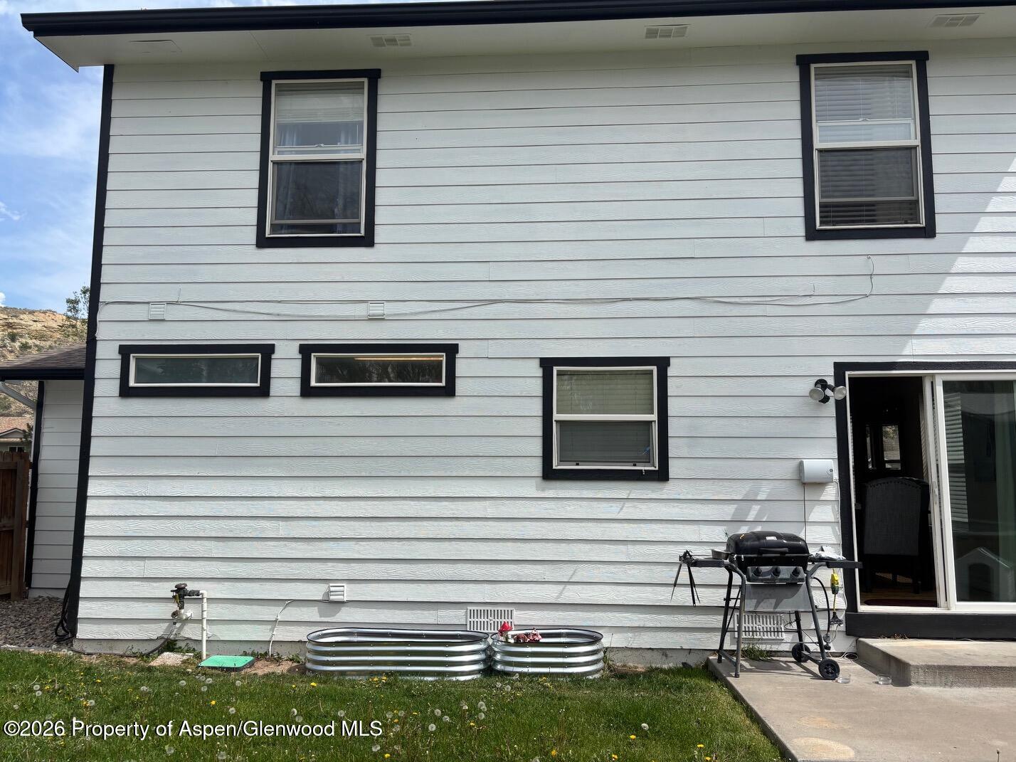 2603 Acacia Avenue Rifle, CO 81650 - Photo 27 of 29 a view of a house with a balcony