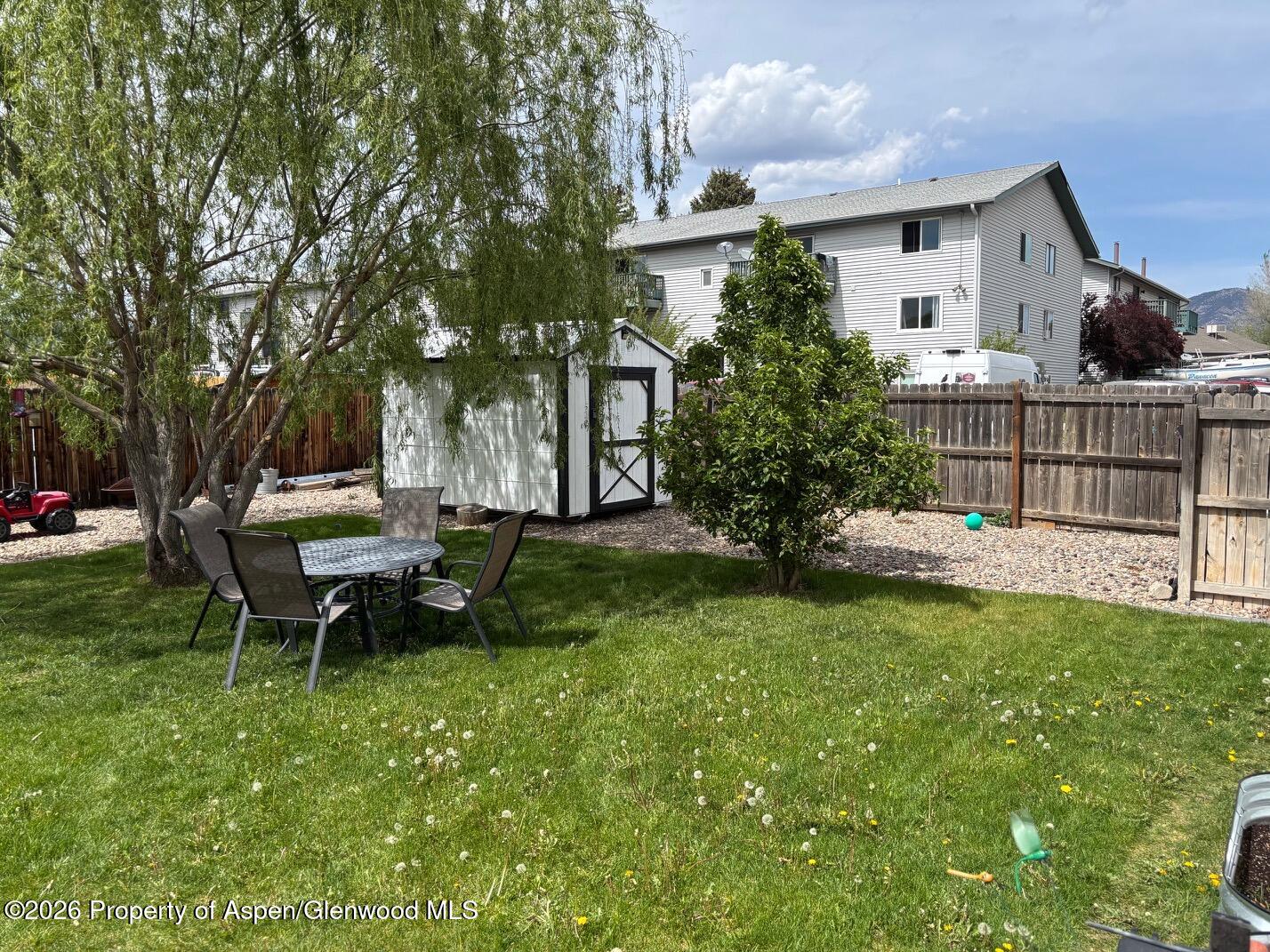 2603 Acacia Avenue Rifle, CO 81650 - Photo 29 of 29 a view of a house with backyard and sitting area