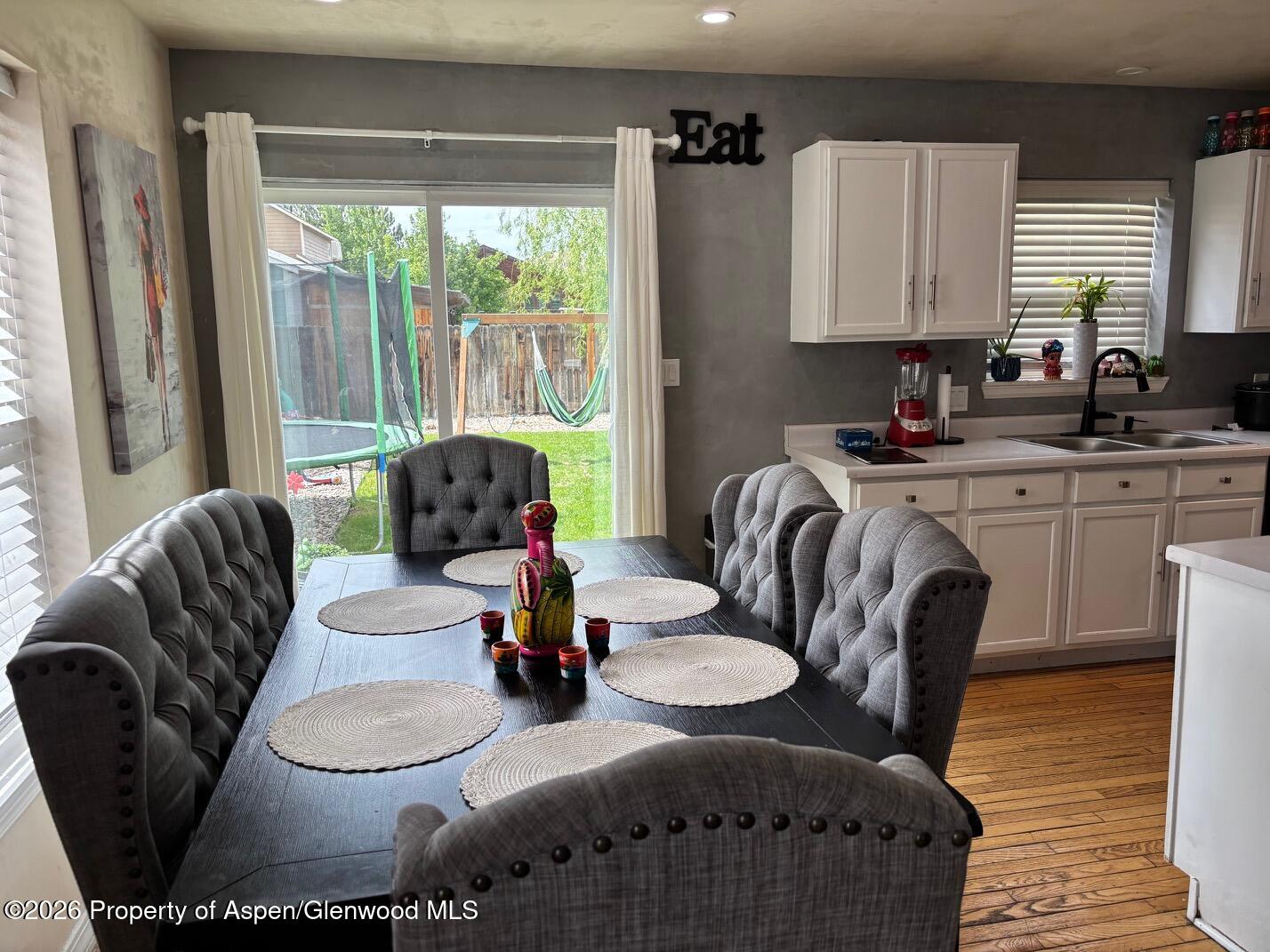 2603 Acacia Avenue Rifle, CO 81650 - Photo 6 of 29 a living room with furniture and a large window