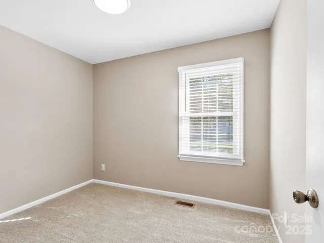 a view of a room with a window