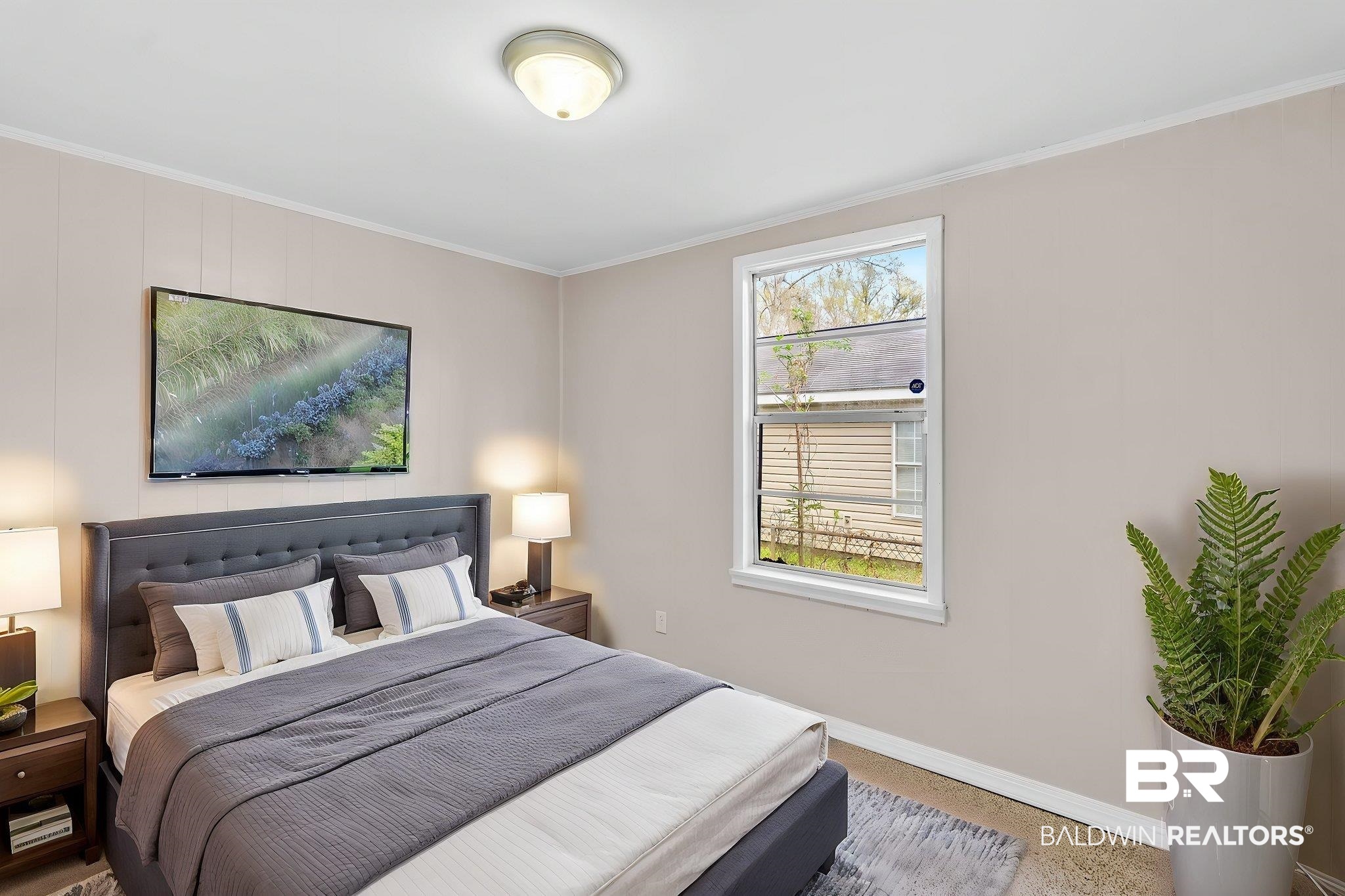 66 11th Avenue Chickasaw, AL 36611 - Photo 11 of 15 Bedroom with baseboards and ornamental molding