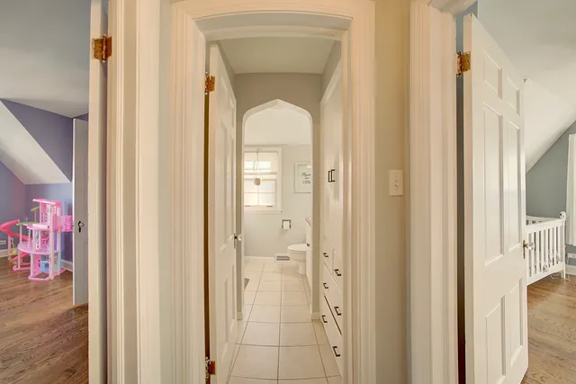 a view of a bathroom from a hallway