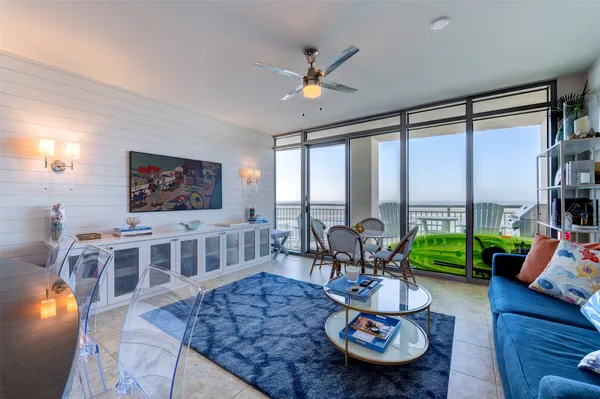 a living room with furniture and a table