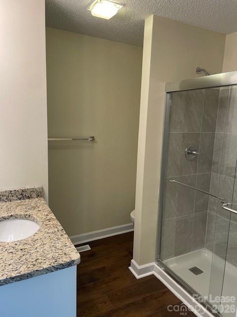 103 South Ridge Avenue, Unit 5 Kannapolis, NC 28083 - Photo 4 of 13 a bathroom with a granite countertop sink and a mirror