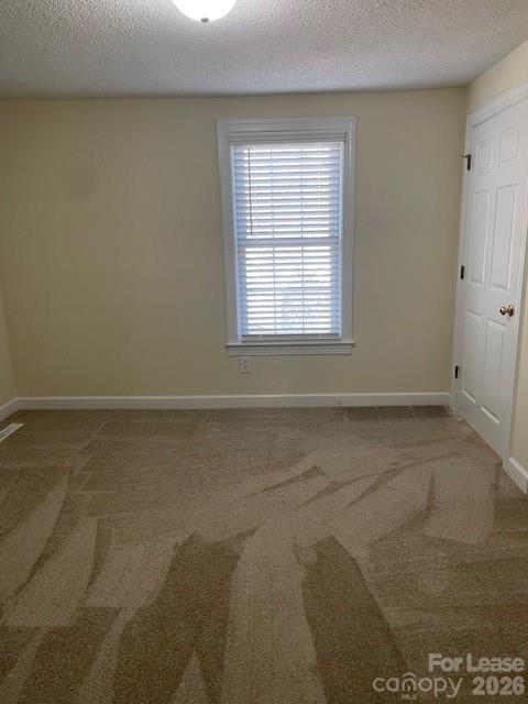 103 South Ridge Avenue, Unit 5 Kannapolis, NC 28083 - Photo 7 of 13 an empty room with a window