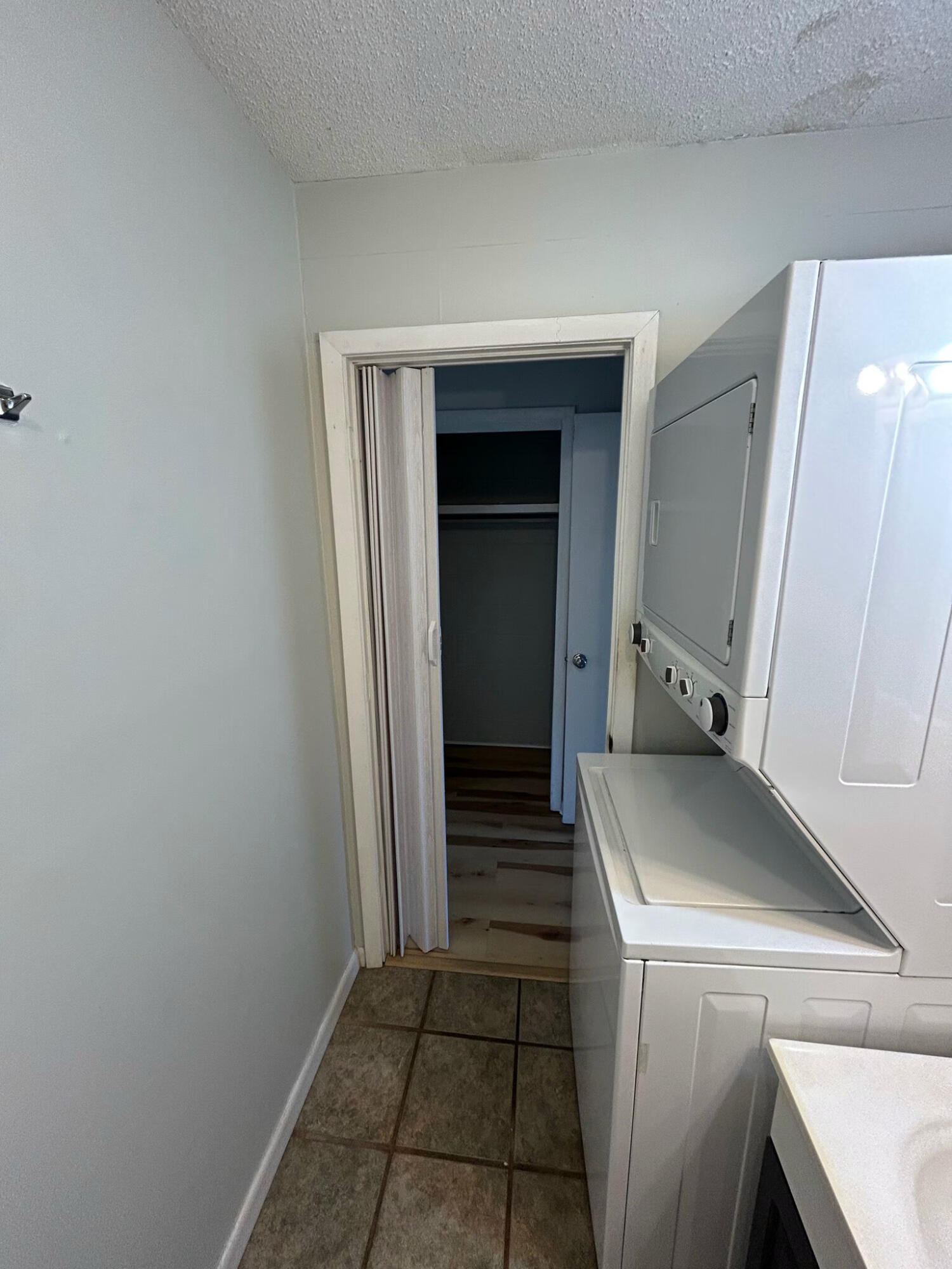 302 Santa Rosa Boulevard, Unit 11 Fort Walton Beach, FL 32548 - Photo 7 of 9 a kitchen with a sink and cabinets