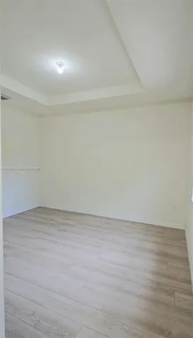 a bathroom with a shower a toilet and a sink