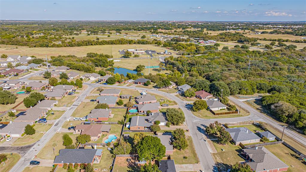 2924 Meandering Way Granbury, TX 76049 - Photo 37 of 40 an aerial view of residential houses with outdoor space