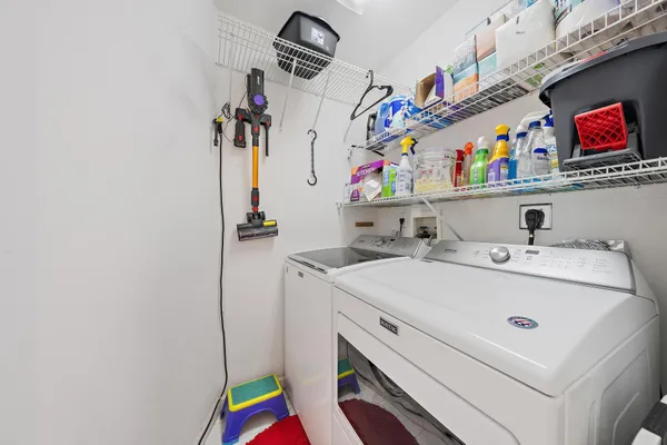 a utility room with dryer and washer