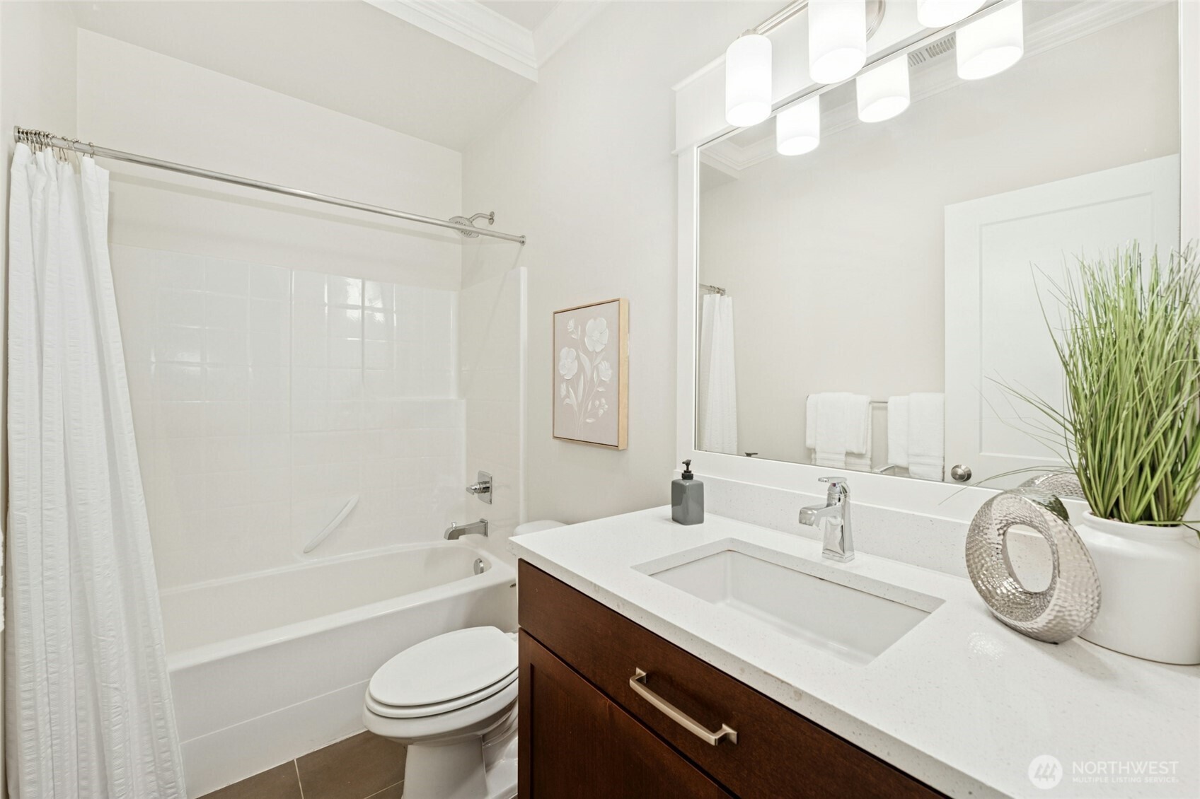 4309 231st Place Southeast Bothell, WA 98021 - Photo 14 of 40 a bathroom with a granite countertop sink a toilet and a large mirror