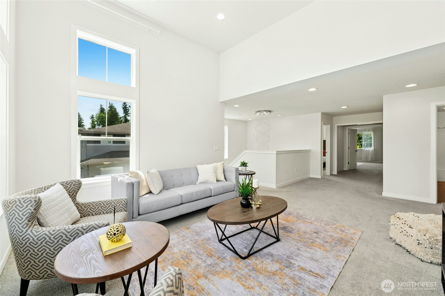 4309 231st Place Southeast Bothell, WA 98021 - Photo 18 of 40 a living room with furniture and a dining table with garden view