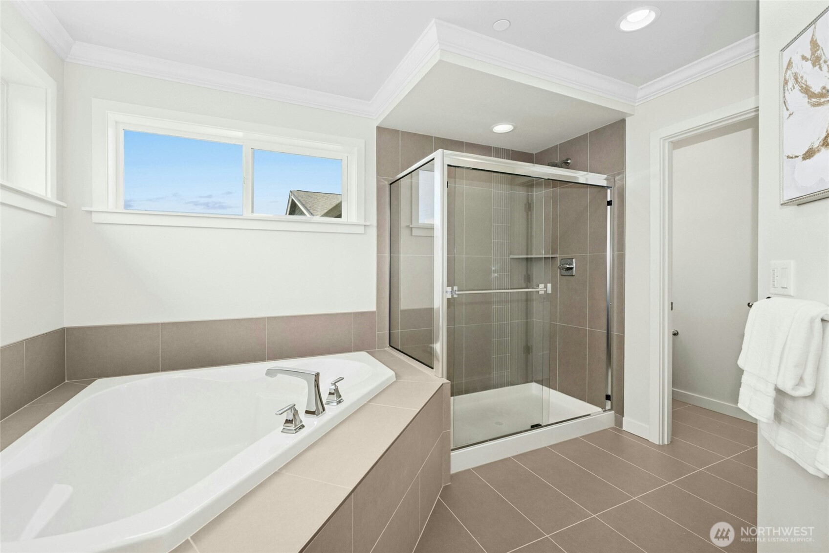 4309 231st Place Southeast Bothell, WA 98021 - Photo 22 of 40 a bathroom with a bathtub and a shower