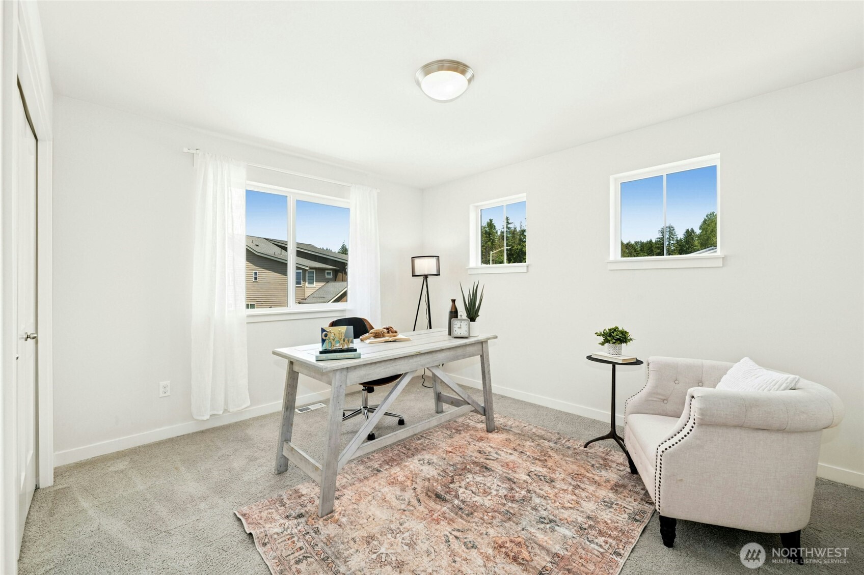 4309 231st Place Southeast Bothell, WA 98021 - Photo 24 of 40 a view of a workspace with furniture