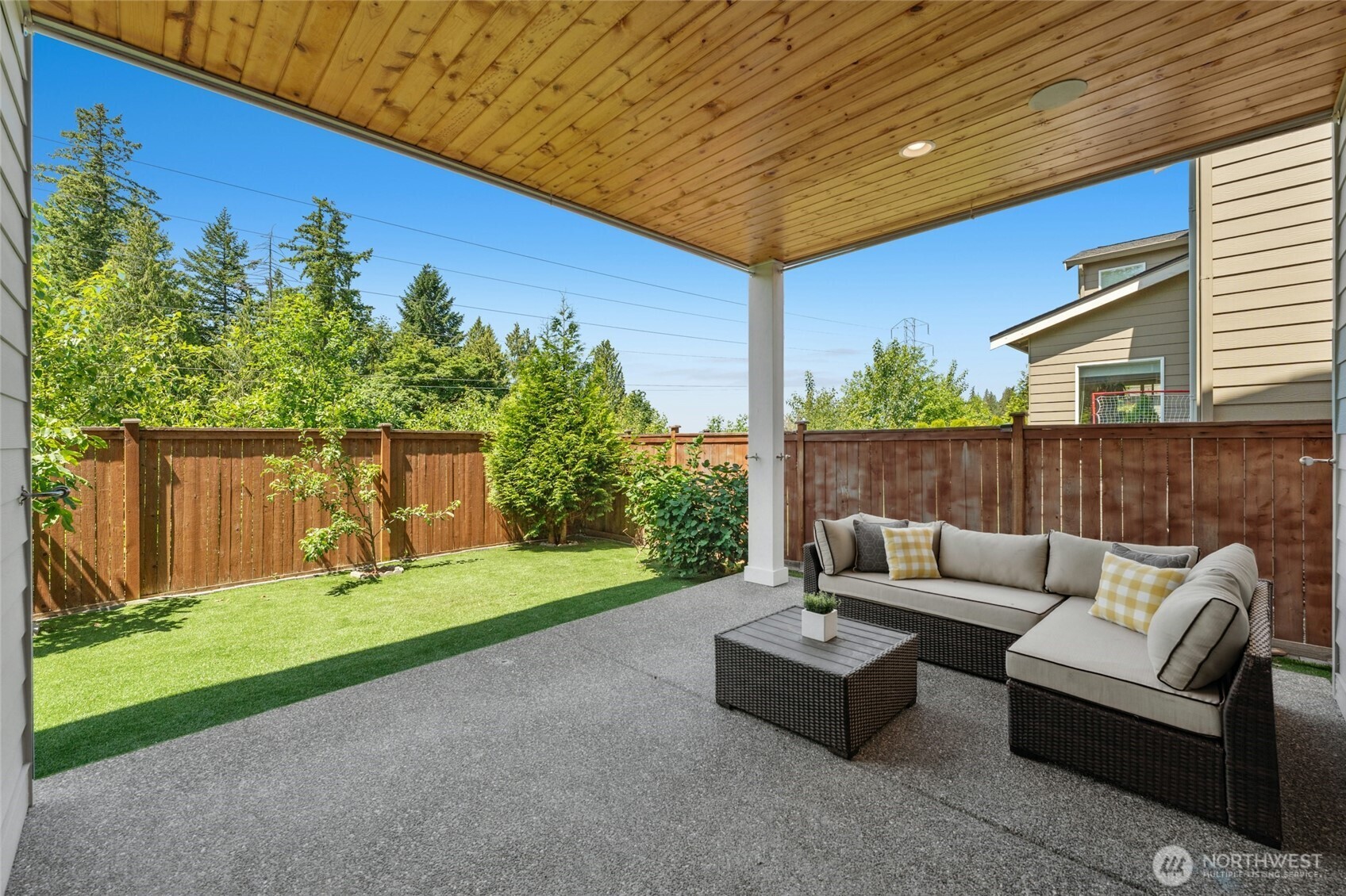 4309 231st Place Southeast Bothell, WA 98021 - Photo 28 of 40 a backyard of a house with table and chairs
