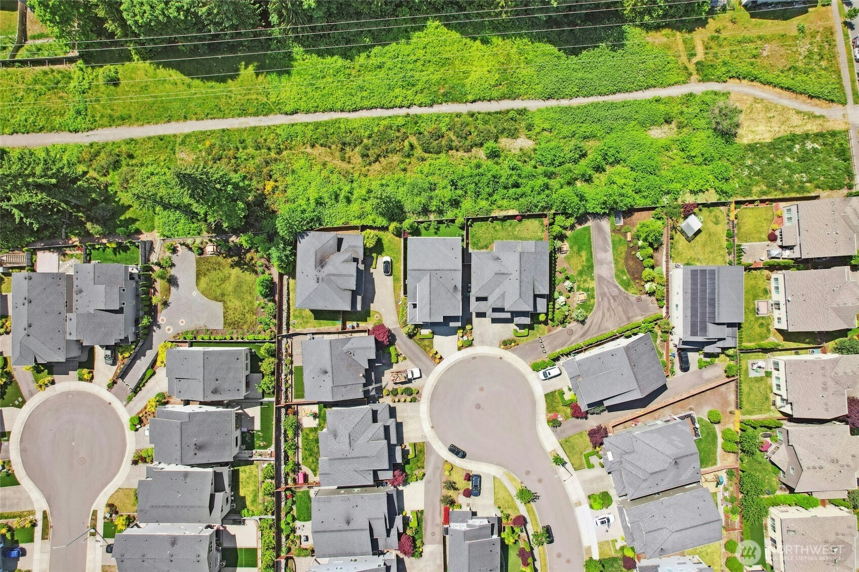 4309 231st Place Southeast Bothell, WA 98021 - Photo 34 of 40 an aerial view of residential houses with outdoor space and swimming pool