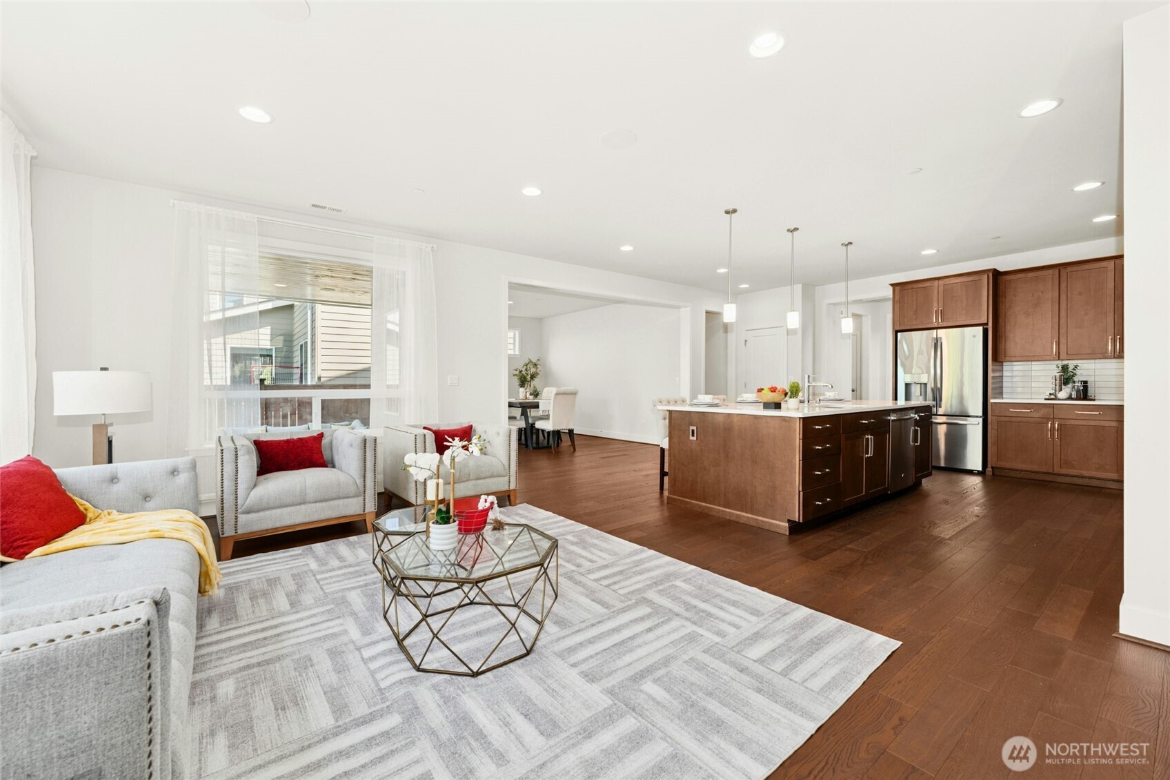 4309 231st Place Southeast Bothell, WA 98021 - Photo 9 of 40 a living room with furniture and kitchen view