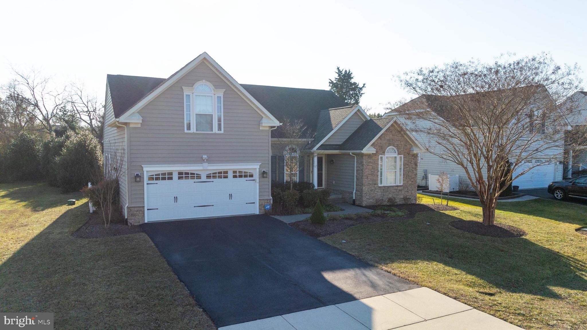 32876 Ocean Reach Lewes, DE 19958 - Photo 2 of 68 a view of a house with a yard
