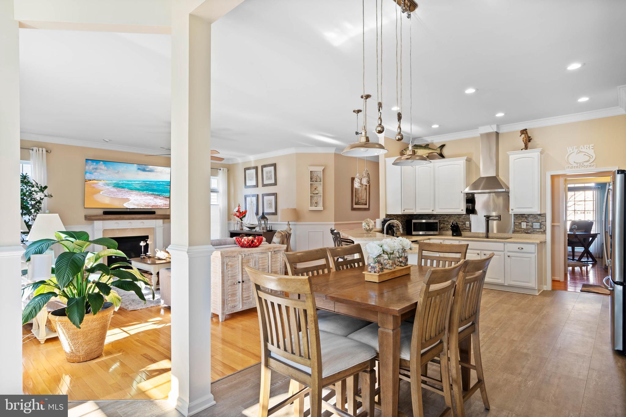 32876 Ocean Reach Lewes, DE 19958 - Photo 28 of 68 a view of a dining room with furniture and wooden floor