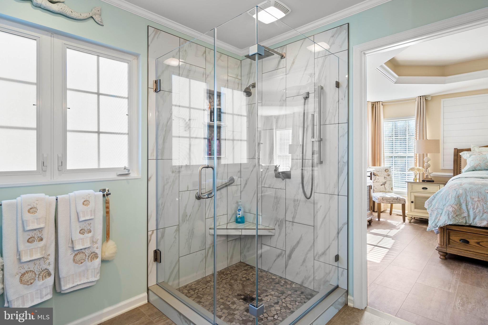 32876 Ocean Reach Lewes, DE 19958 - Photo 31 of 68 a bathroom with a tub shower and a sink