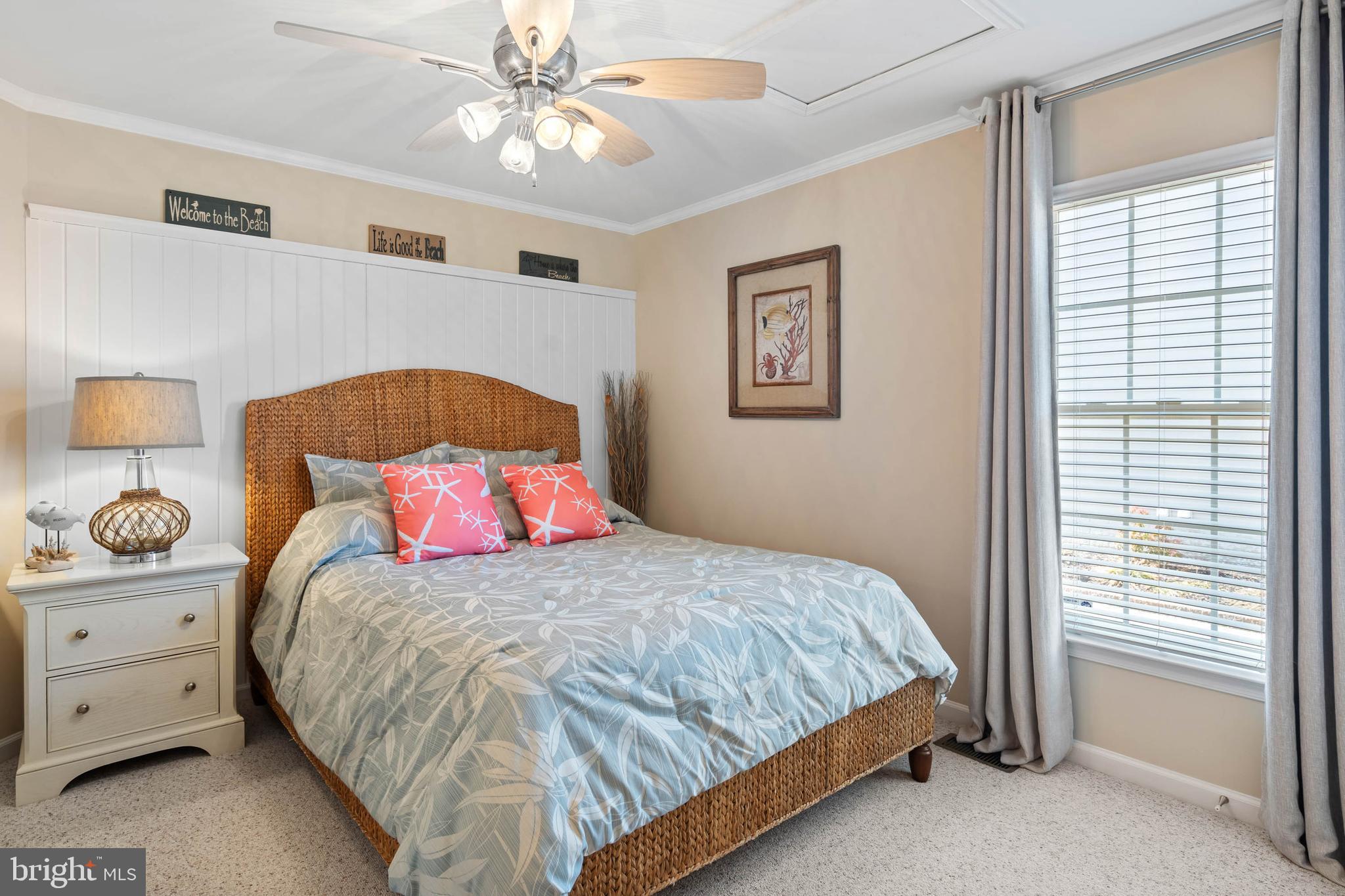 32876 Ocean Reach Lewes, DE 19958 - Photo 37 of 68 a bedroom with a bed and a window
