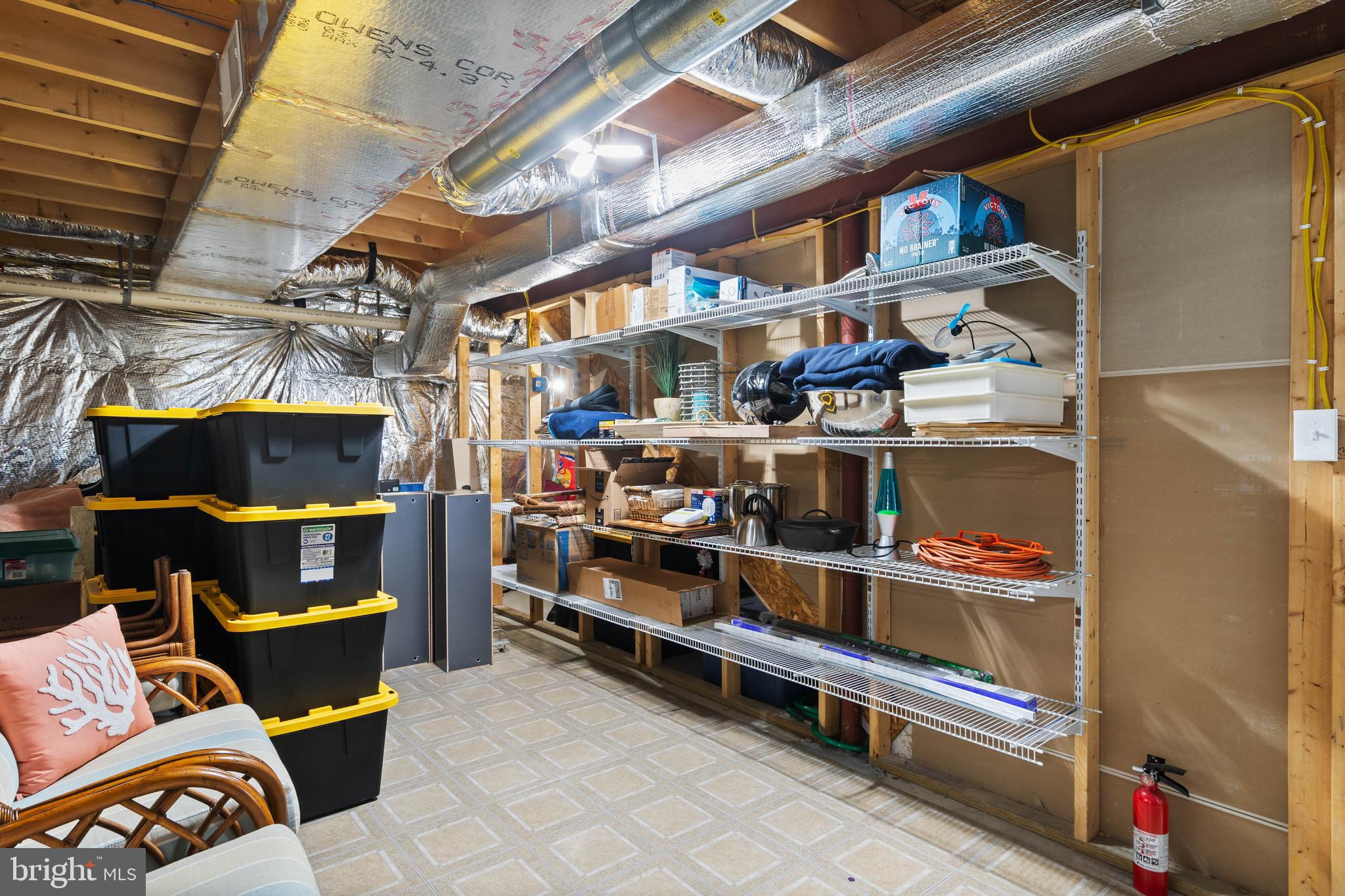 32876 Ocean Reach Lewes, DE 19958 - Photo 53 of 68 a view of store room with cabinet