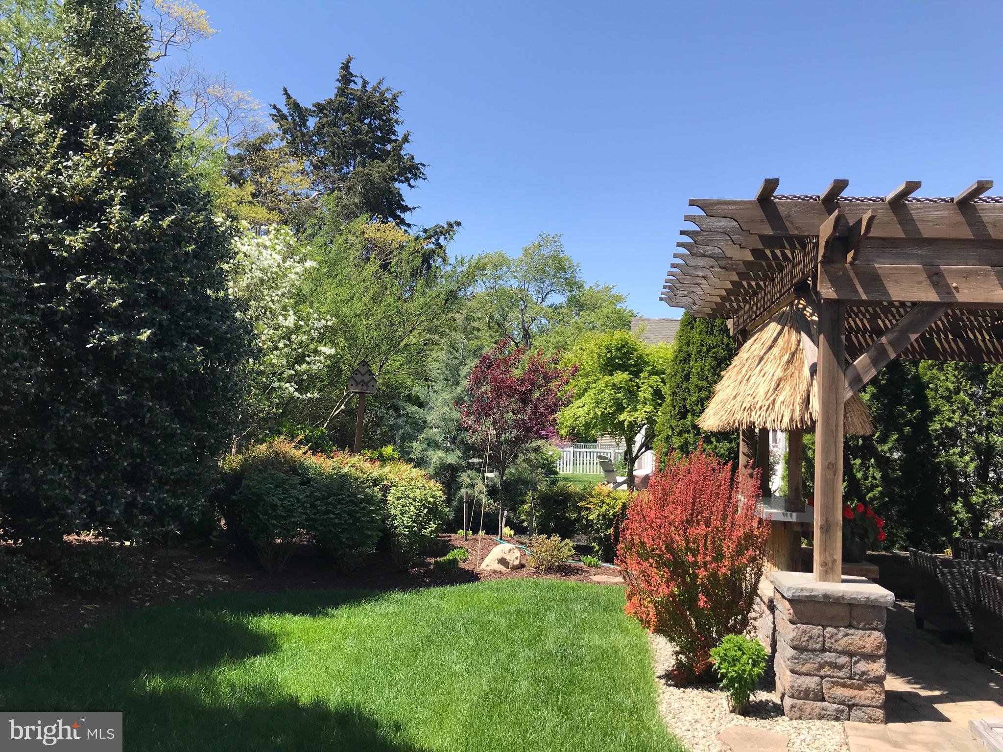 32876 Ocean Reach Lewes, DE 19958 - Photo 59 of 68 a view of a house with a yard and a sitting area