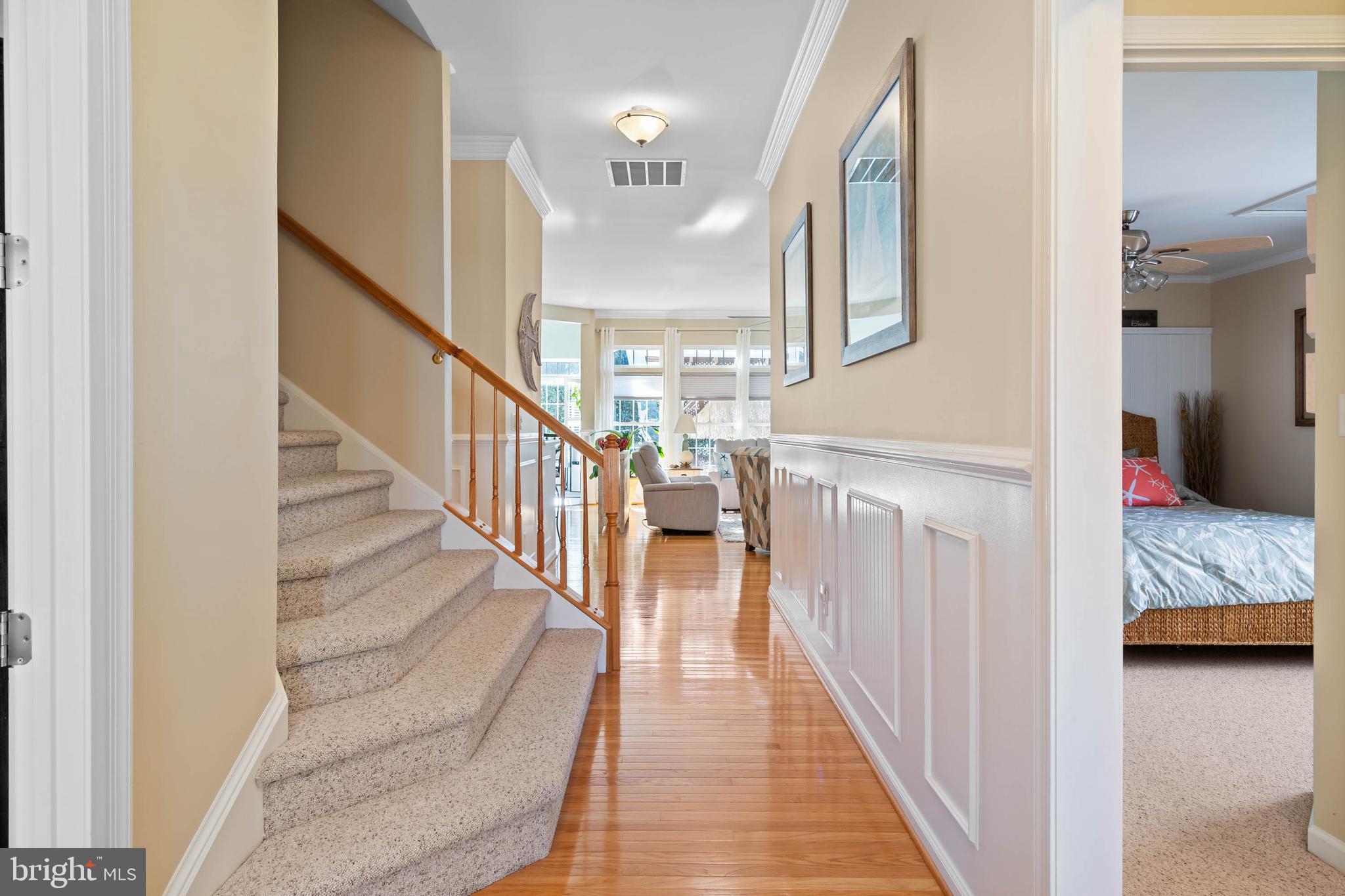 32876 Ocean Reach Lewes, DE 19958 - Photo 7 of 68 a view of entryway and hall with wooden floor