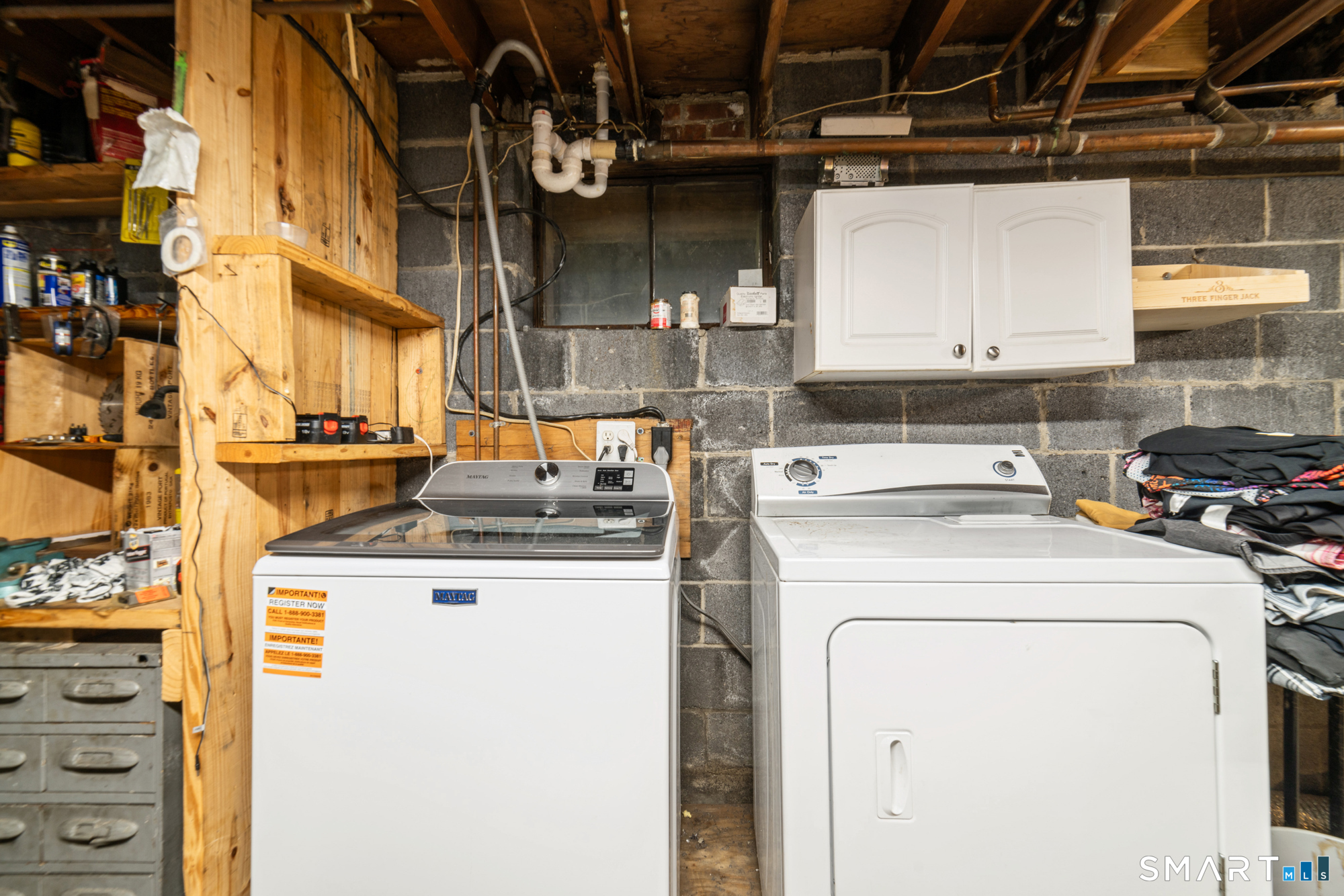 146 Highland Drive Waterbury, CT 06708 - Photo 18 of 31 a utility room with dryer and washer