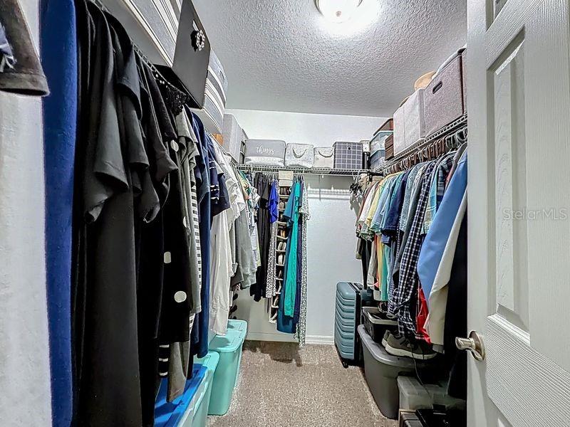 20156 Southwest 83rd Place Dunnellon, FL 34431 - Photo 19 of 28 a view of walk in closet with clothes