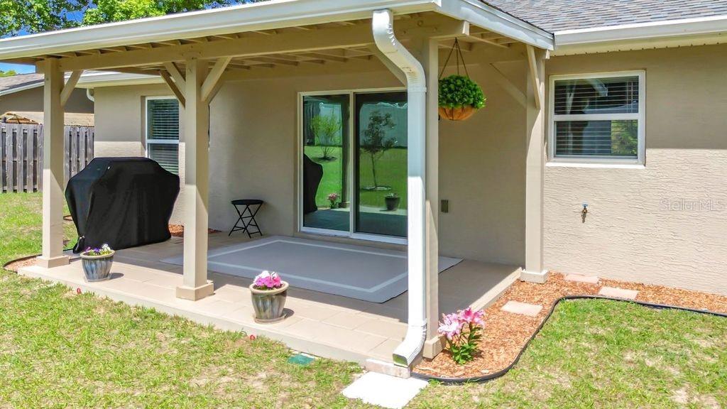 20156 Southwest 83rd Place Dunnellon, FL 34431 - Photo 24 of 28 a view of a house with backyard and sitting area