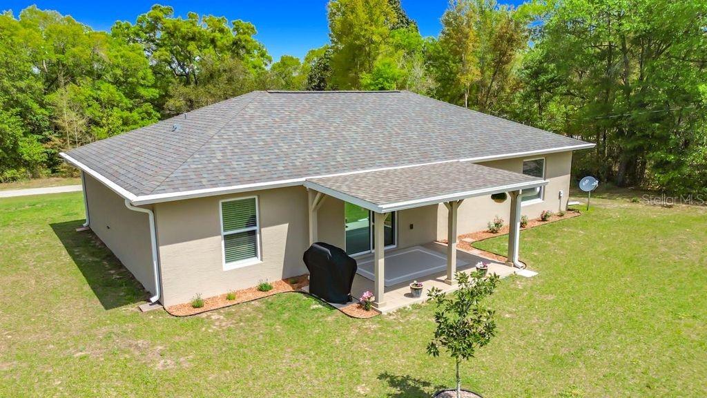 20156 Southwest 83rd Place Dunnellon, FL 34431 - Photo 26 of 28 a view of a house with backyard