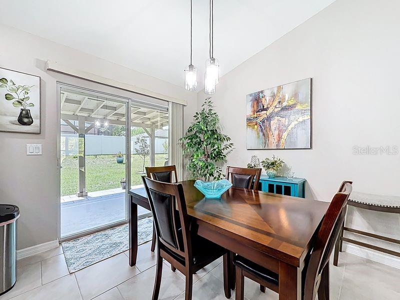 20156 Southwest 83rd Place Dunnellon, FL 34431 - Photo 7 of 28 a view of a dining room with furniture window and outside view