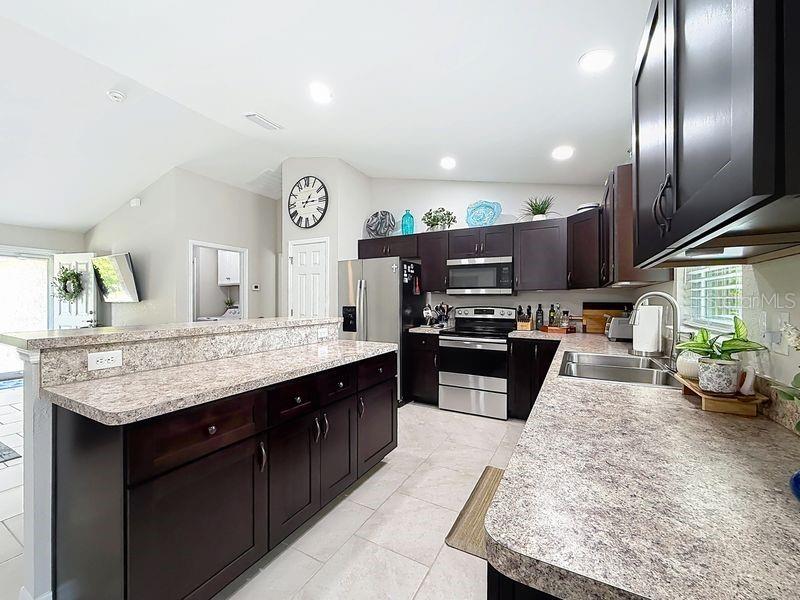 20156 Southwest 83rd Place Dunnellon, FL 34431 - Photo 10 of 28 a kitchen with granite countertop lots of counter top space