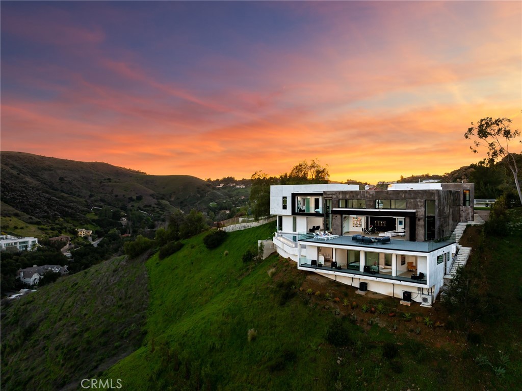 18 Stallion Road Bell Canyon, CA 91307 - Photo 1 of 1 a view of a house with a backyard space