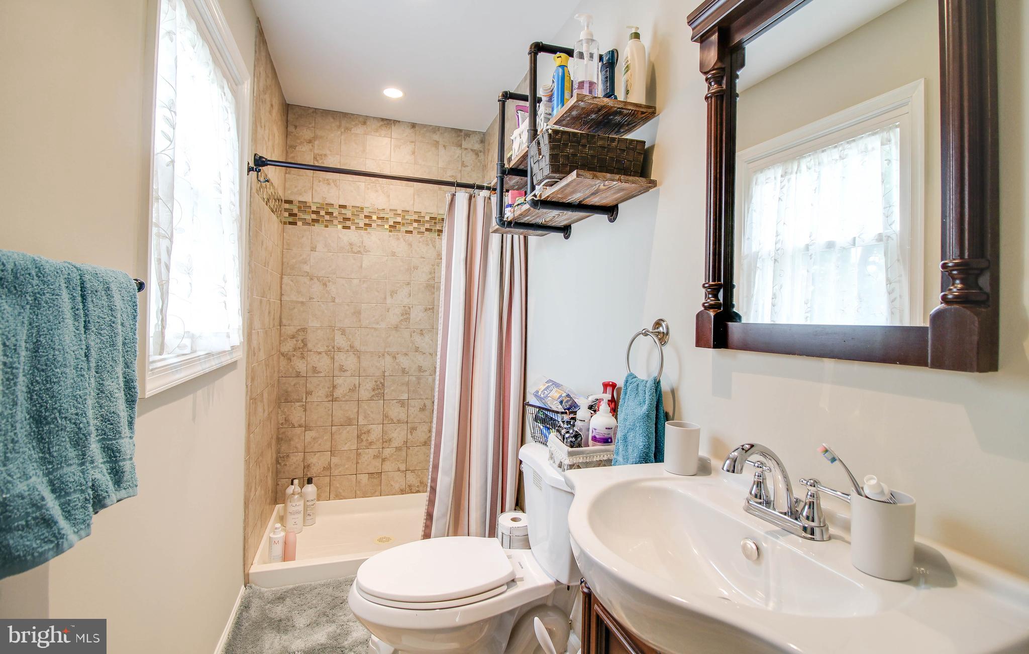 708 Dorchester Road Baltimore, MD 21229 - Photo 19 of 50 Primary full bath