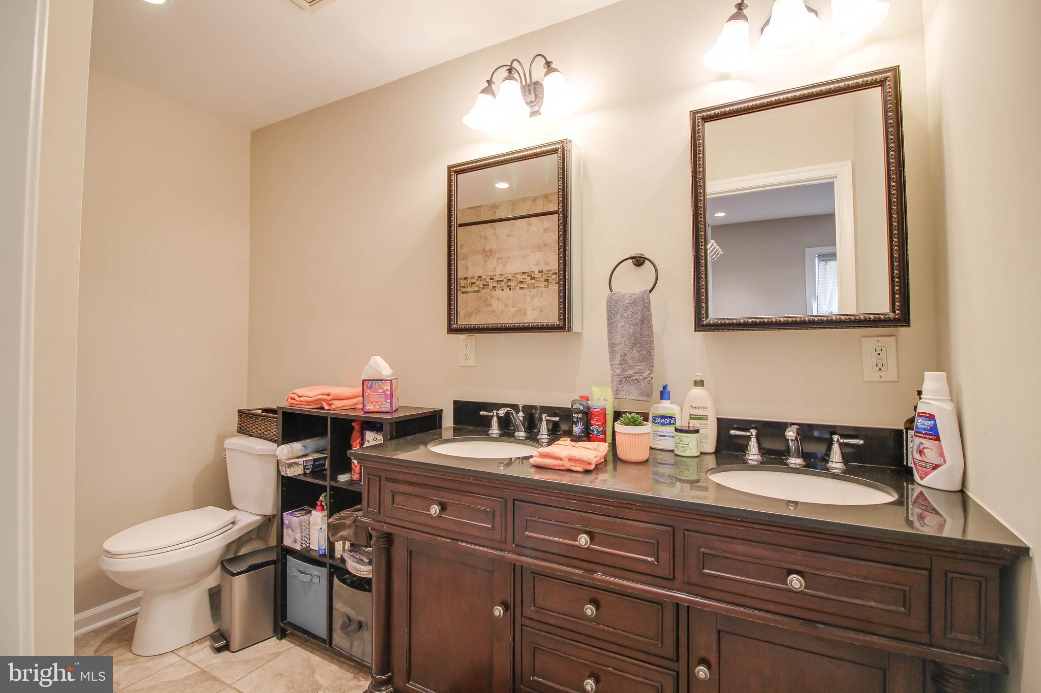 708 Dorchester Road Baltimore, MD 21229 - Photo 26 of 50 Full bath with double vanties