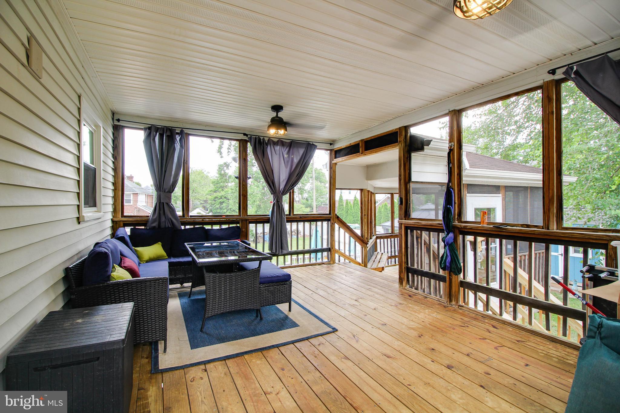 708 Dorchester Road Baltimore, MD 21229 - Photo 34 of 50 screened porch off kitchen