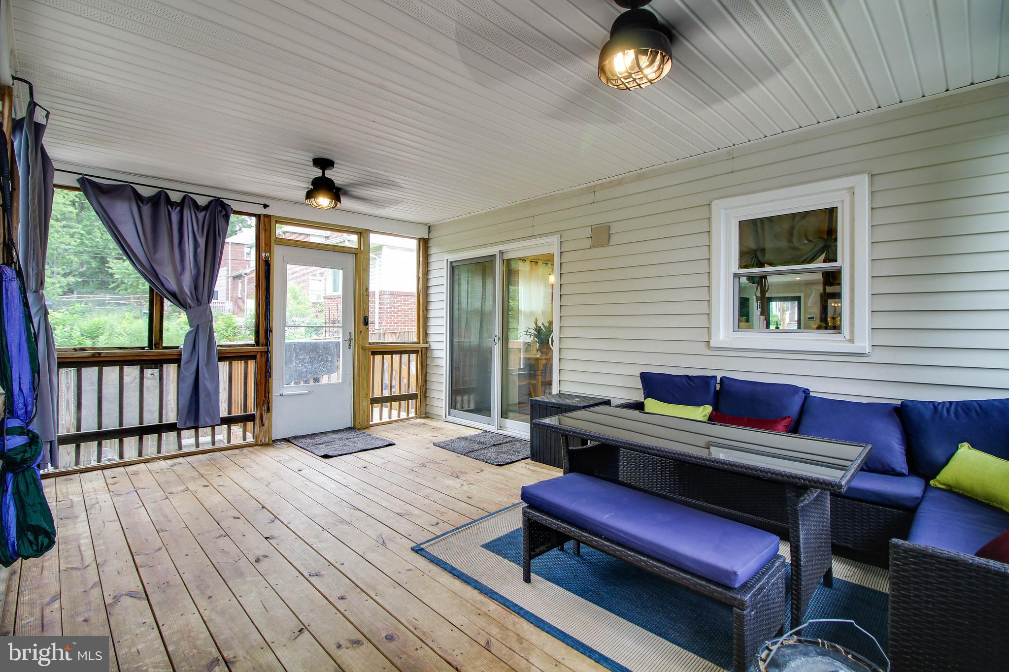 708 Dorchester Road Baltimore, MD 21229 - Photo 35 of 50 screened porch off kitchent
