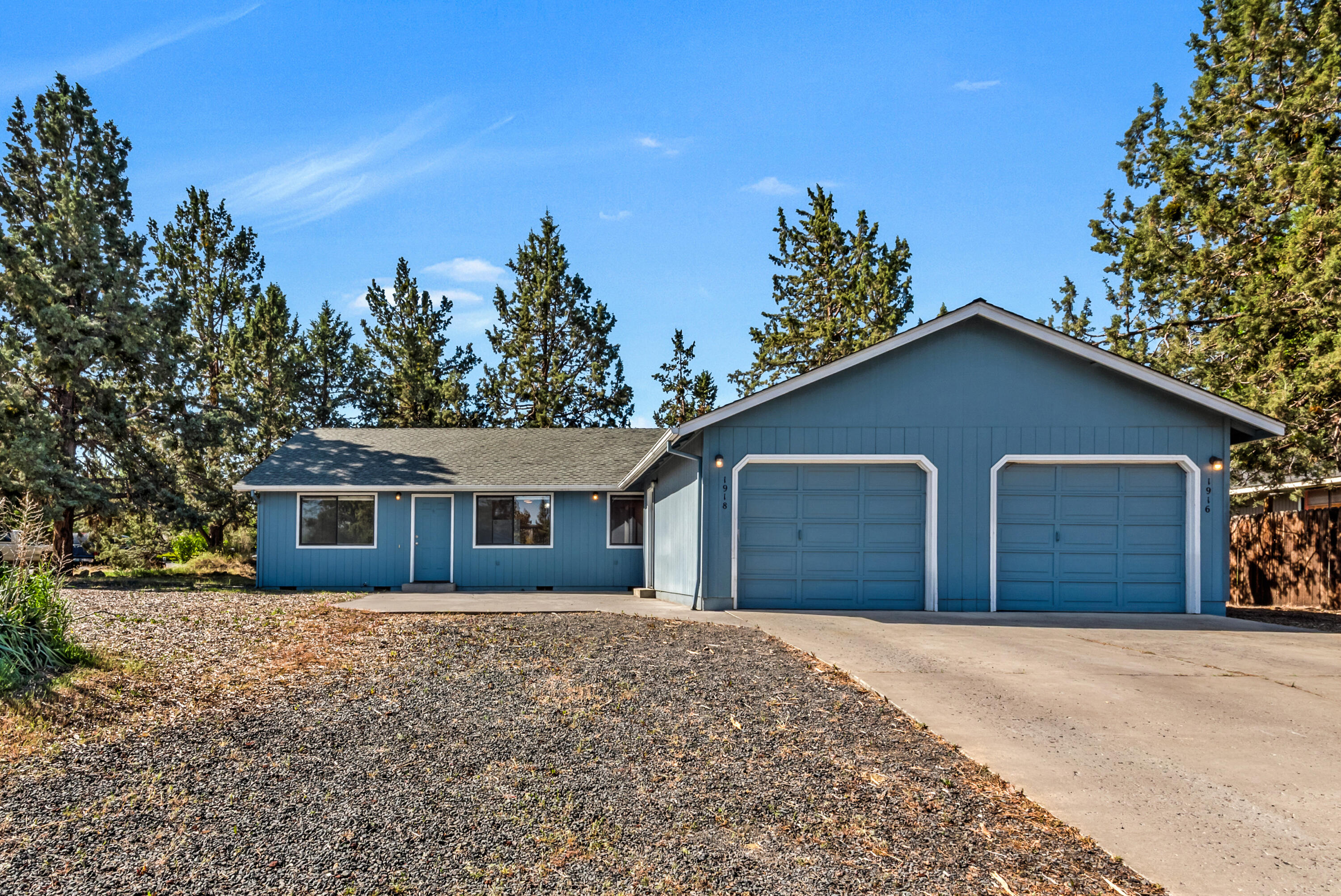 1916 Northeast Wichita Way Bend, OR 97701 - Photo 2 of 38 front view of a house with a yard