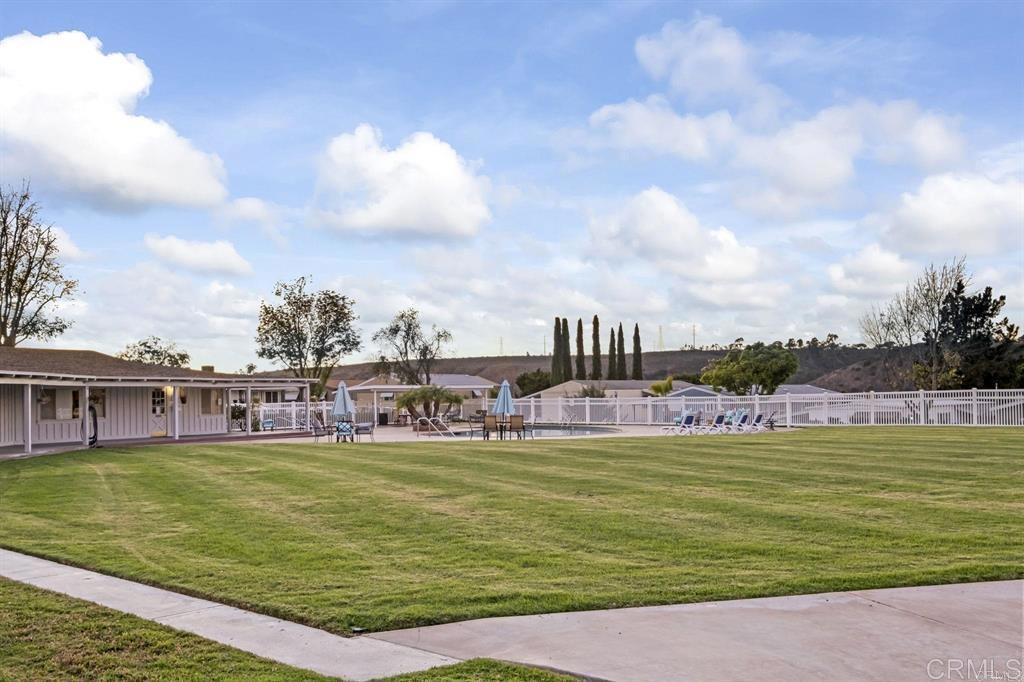 4812 Old Cliffs Road San Diego, CA 92120 - Photo 7 of 11 a view of a swimming pool with an ocean view