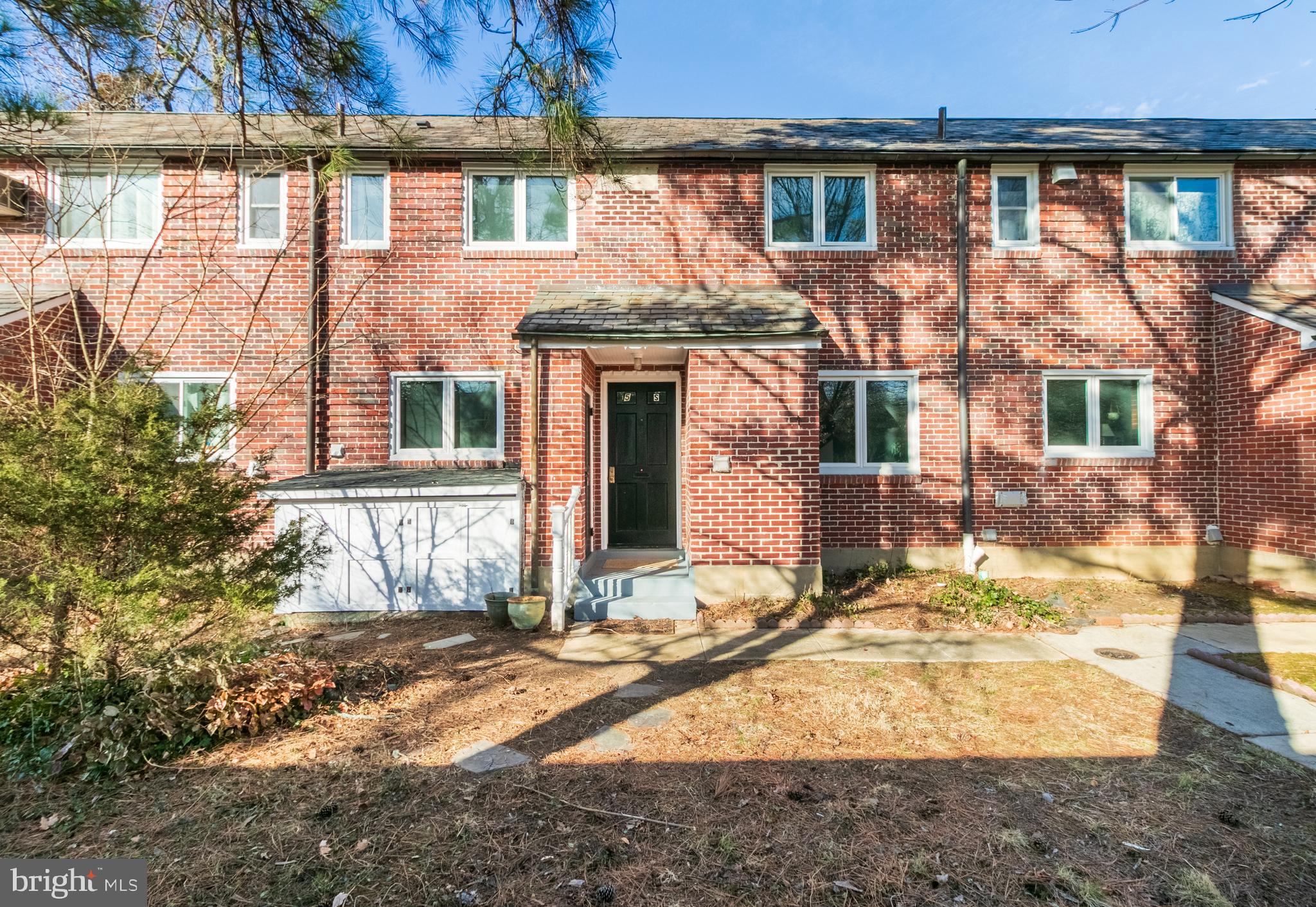 a view of a house with large windows