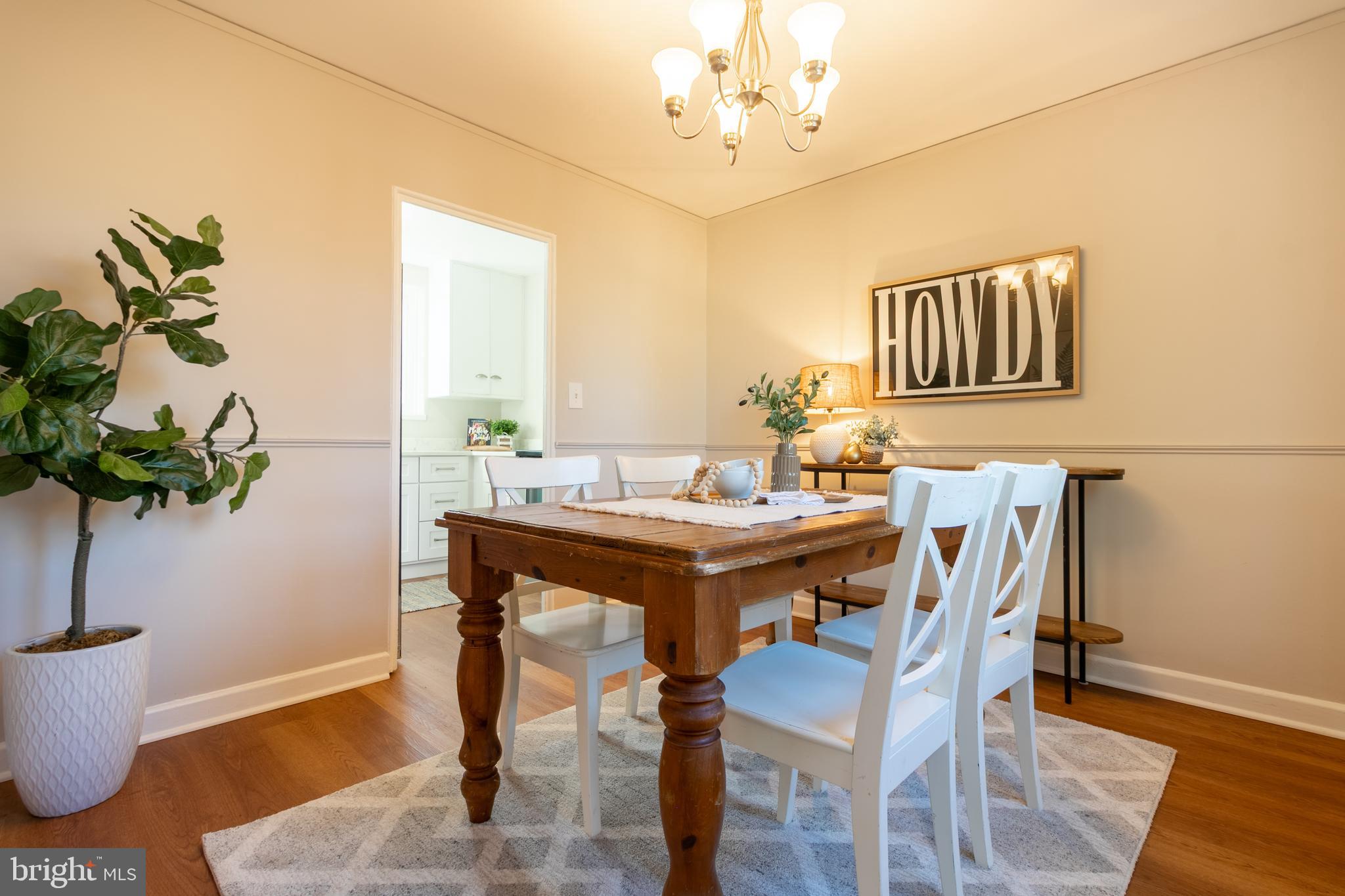 45 Ridge Road Greenbelt, MD 20770 - Photo 11 of 33 a view of a dining room with furniture and wooden floor