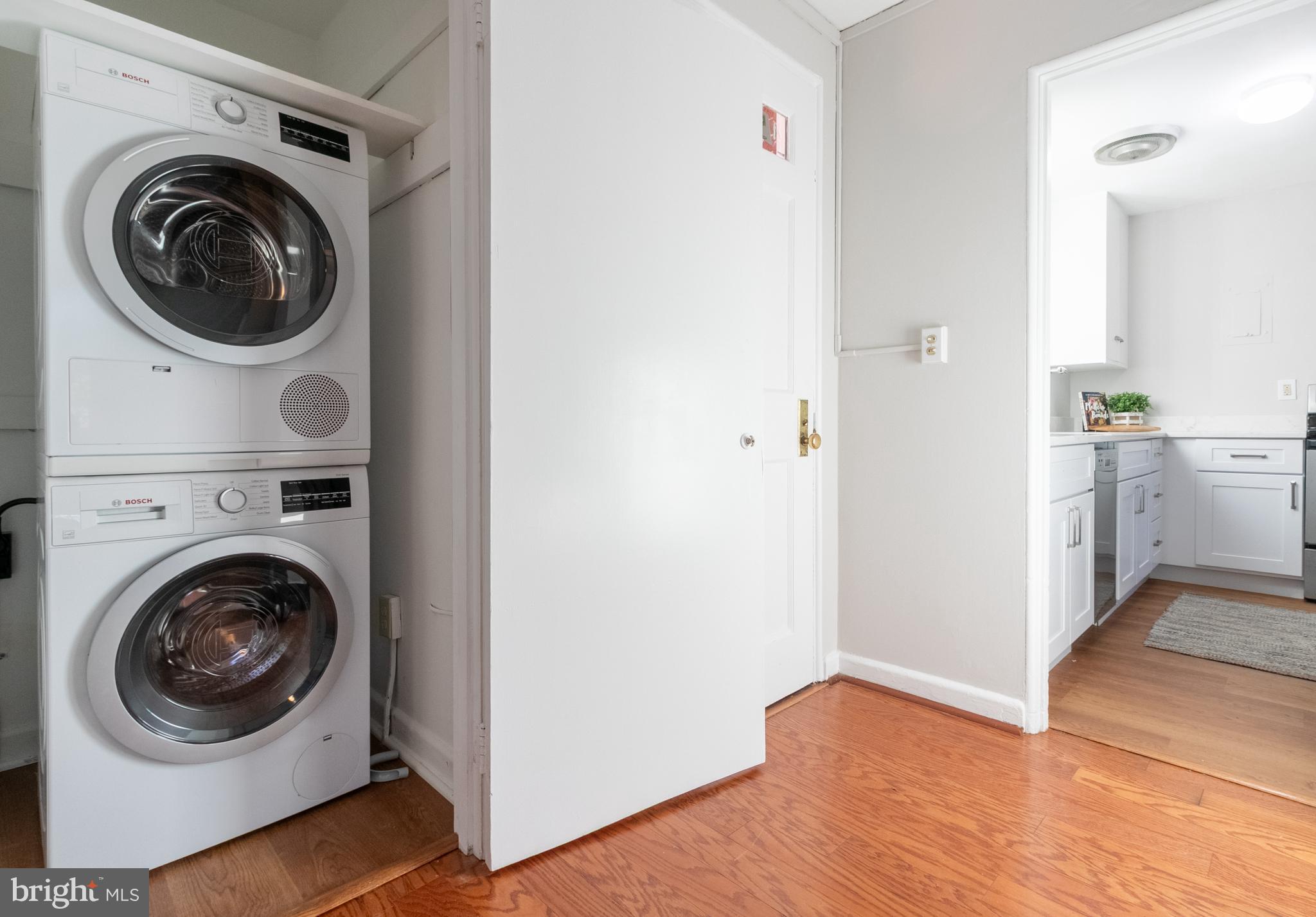 45 Ridge Road Greenbelt, MD 20770 - Photo 12 of 33 a view of a hallway with washer and dryer