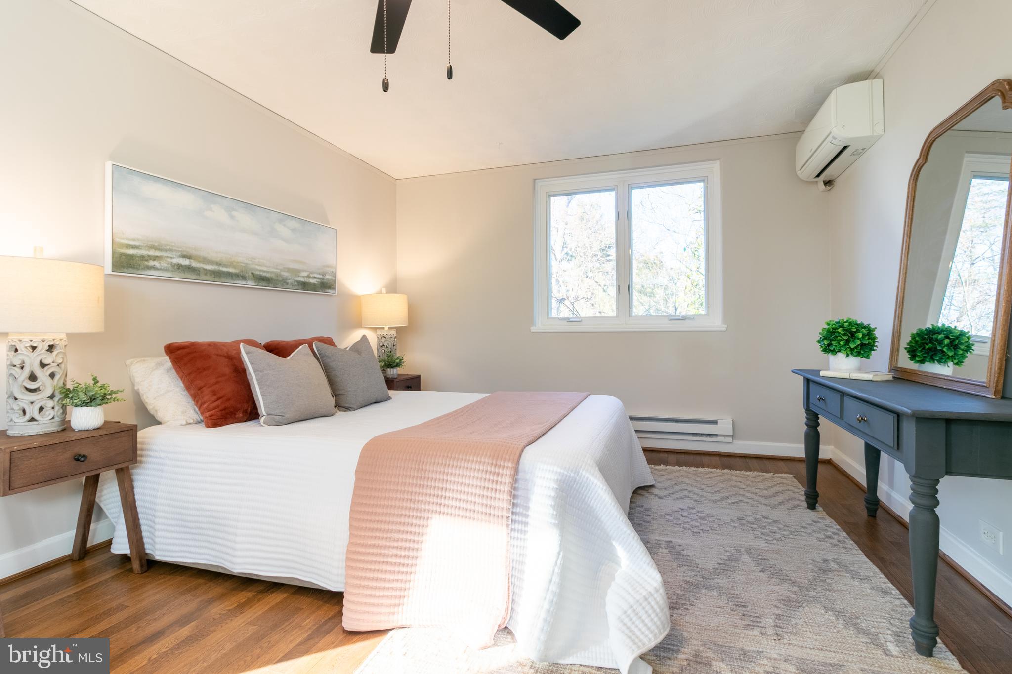 45 Ridge Road Greenbelt, MD 20770 - Photo 22 of 33 a bed room with a bed and a tv