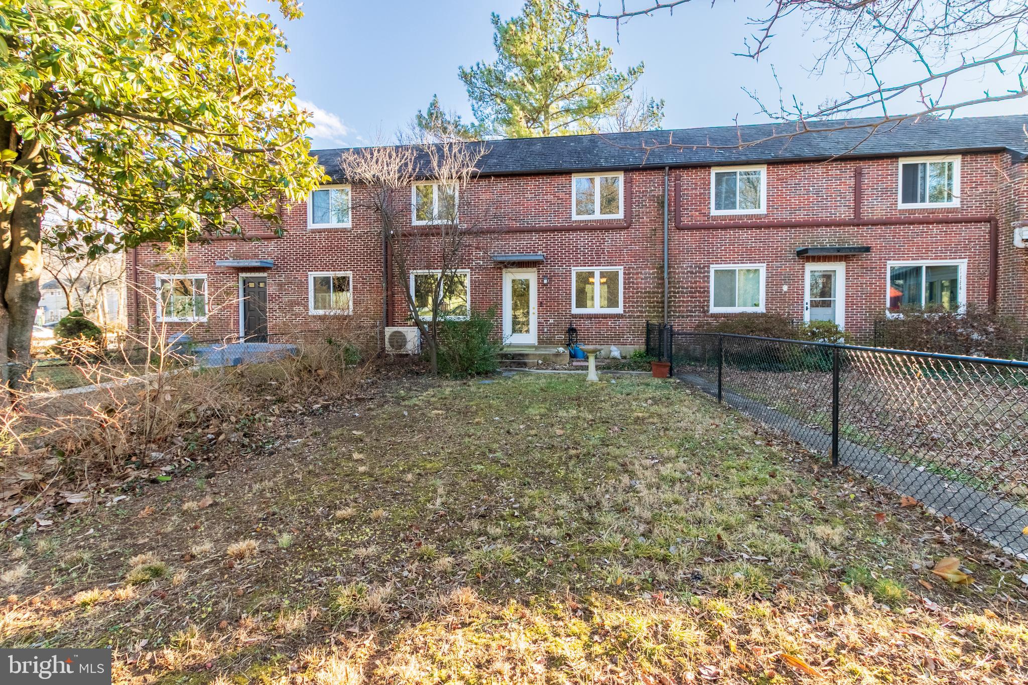 45 Ridge Road Greenbelt, MD 20770 - Photo 28 of 33 a front view of a house with a yard