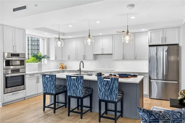 a bathroom with a sink a mirror and a toilet