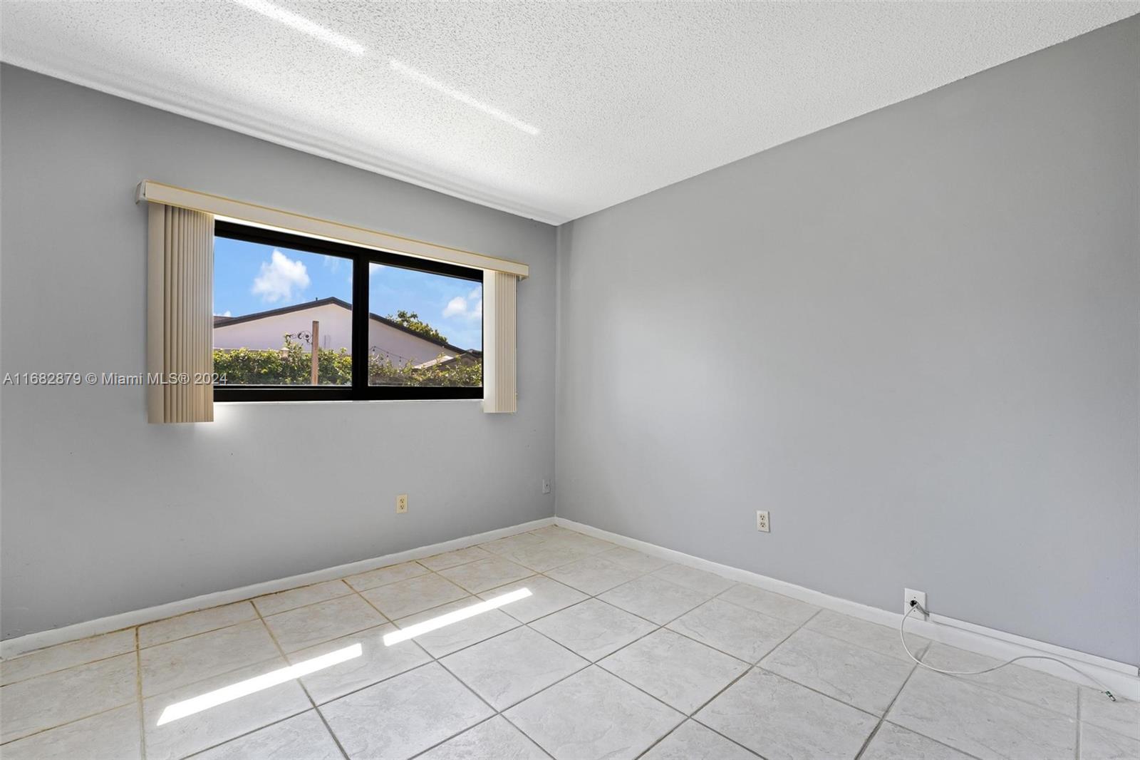 14006 Southwest 48th Terrace Miami, FL 33175 - Photo 14 of 24 a view of empty room