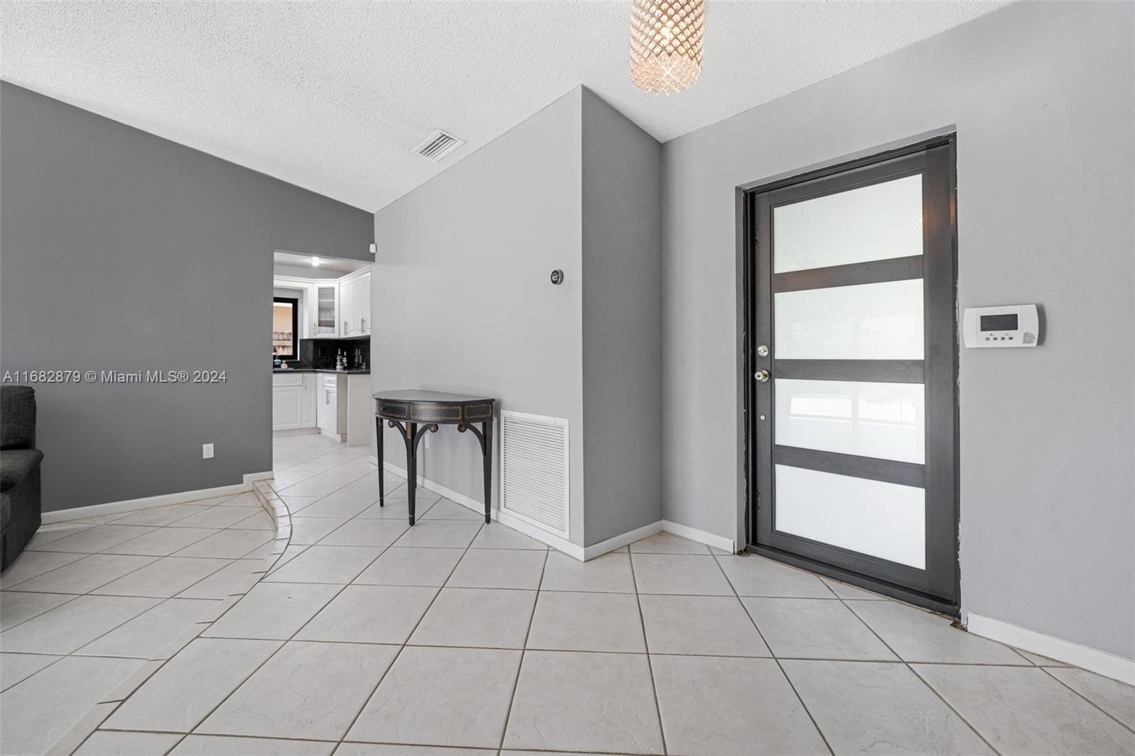 14006 Southwest 48th Terrace Miami, FL 33175 - Photo 18 of 24 a view of an empty room with a window