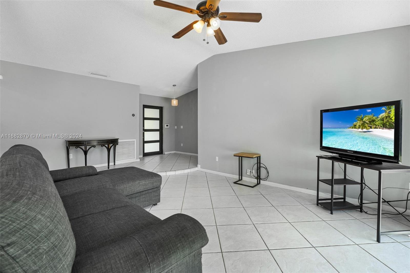 14006 Southwest 48th Terrace Miami, FL 33175 - Photo 23 of 24 a living room with furniture